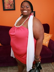 Ebony BBW Chocolat Hottie is all smiles while showing off her enormous chocolate knockers